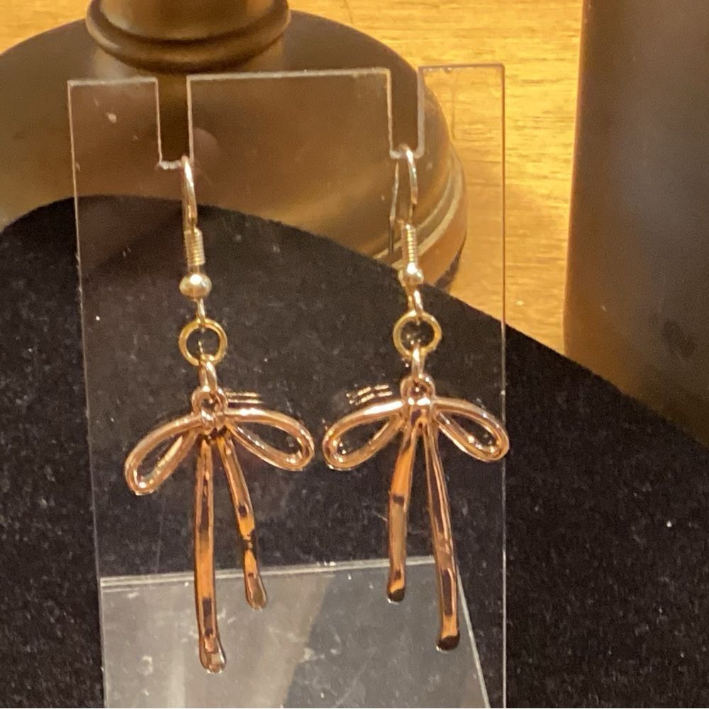 NWOT. Shiny Gold Tone Bow Earrings Fishhook Drop Style